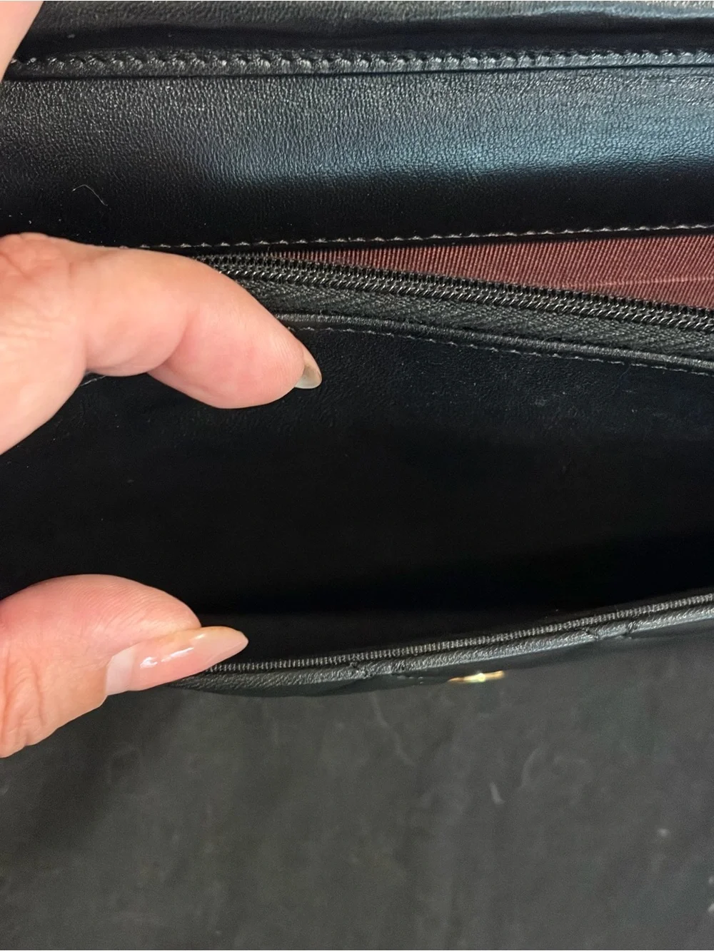 CHANEL Black Quilted Leather Wallet-on-Chain with Gold Hardware